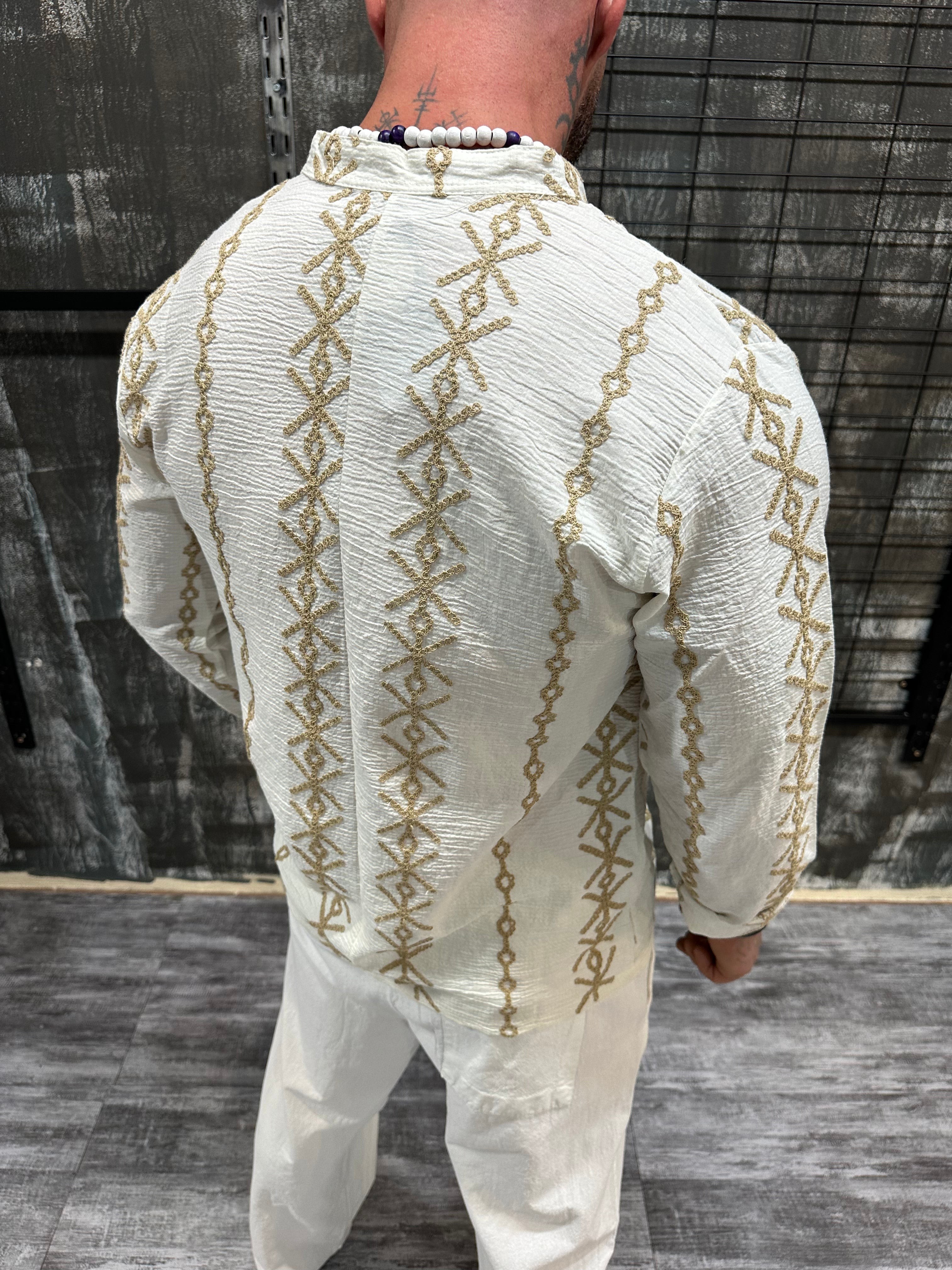 Риза DJANI
